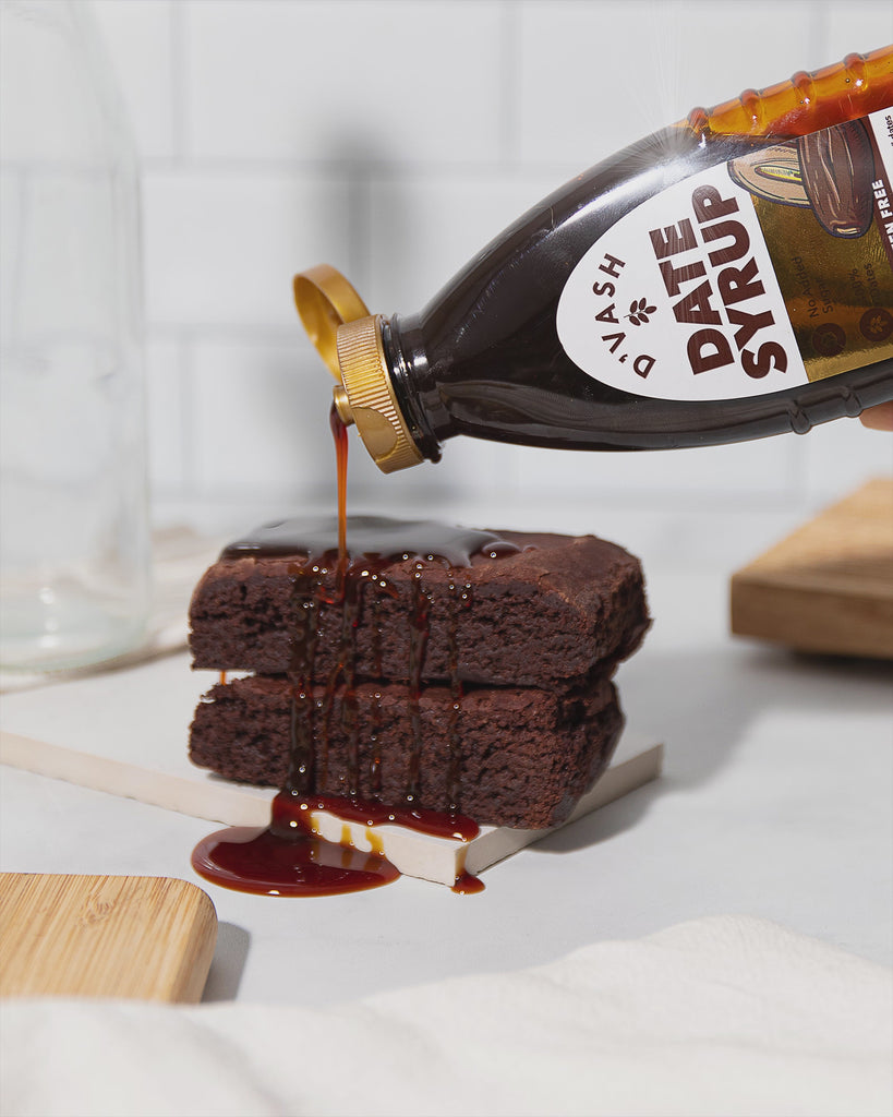 date syrup drizzled onto brownie gif 